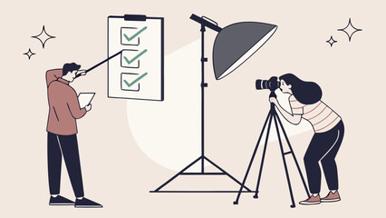 Photographers and assistant preparing for a professional studio photoshoot with equipment.