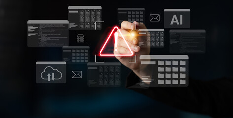 A hand reaches towards a digital interface filled with warning signs and data icons, representing modern technology themes like AI, cloud computing, and security innovation. Gantry