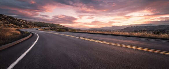 The Road Curving Through Golden Hills Under a Dramatic Pink Sunset Sky