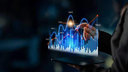 A professional analyzing financial data on a sleek tablet. The dynamic graphs highlight market...