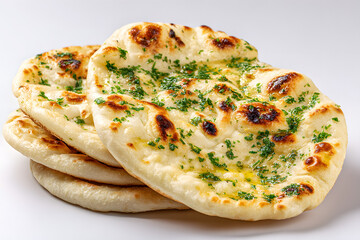 Naan bread topped with parsley and garlic, showcasing soft texture and flatbread cuisine.