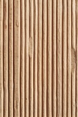 Brown corrugated cardboard texture with vertical ridges