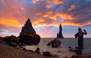 Reynisfjara black sand beach at amazing sunset, near the village of Vik, Iceland