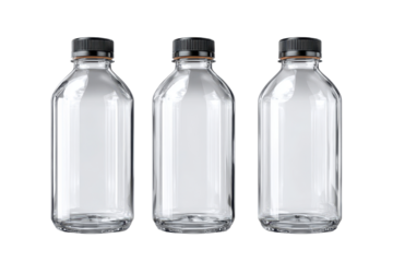 Clear glass bottles lined up on a plain background showing their shape and design for potential packaging or branding ideas