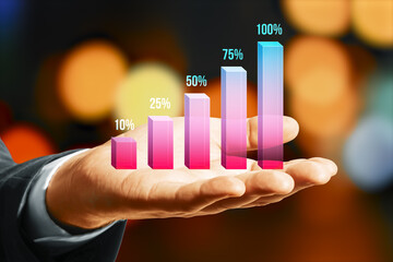 Businessman hand showing colorful growth chart bars from 10% to 100% with bokeh lights background representing success and achievement goals.