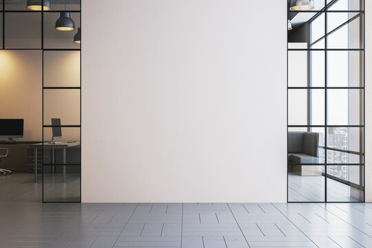 Blank wall in modern office interior with glass partitions and city view through windows, ideal for mockup, logo, or poster display concept. 3D Rendering