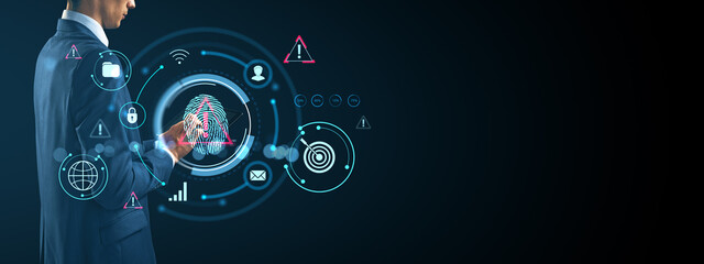 Businessman using biometric fingerprint authentication on futuristic digital interface with secure...
