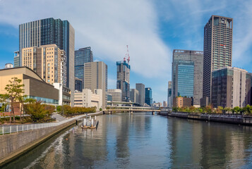 Obraz premium River front view of the city center of Osaka, Honshu, Japan