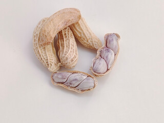 Group of boiled peanuts on a white background.