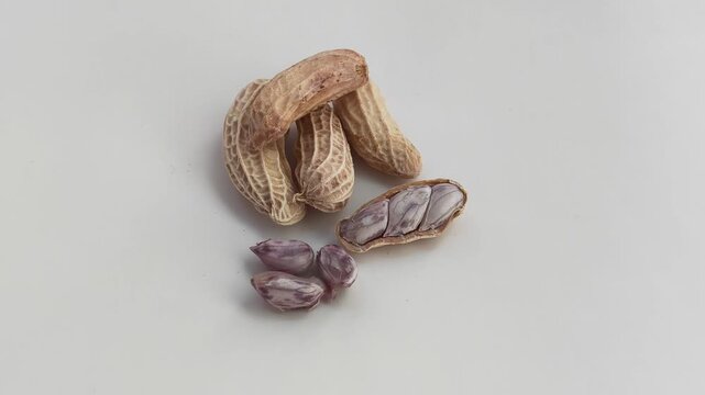 Zoom out. Boiled peanuts on a white background.