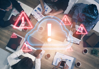 Red alert triangles over a blue cloud icon, symbolizing cloud security threats, system warnings, and data protection risks in digital environments Parse