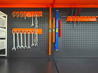 tool kit hanging on the stand wall