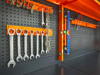 tool kit hanging on the stand wall