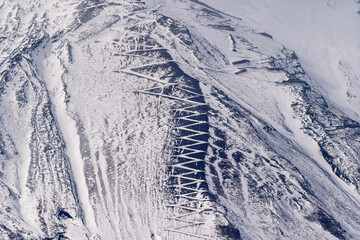 Mount Fuji Close Up, Snow Covered Slopes, Winding Switchbacks, Textured Snow Ridges in Soft Light