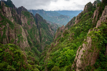 Naklejka premium Beautiful view on the trail of Mount Huangshan, gorgeous rocks and strange pine in the mountain, in Anhui Province, China.