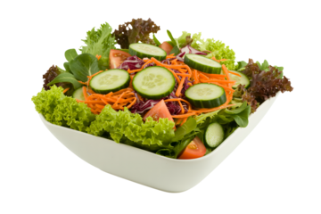 Fresh mixed green salad with vegetables in white bowl