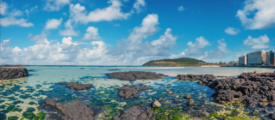 Stunning emerald turquoise waters of Hamdeok Beach, (also known as Hamdeok Seoubonghaebyeon) Olle...
