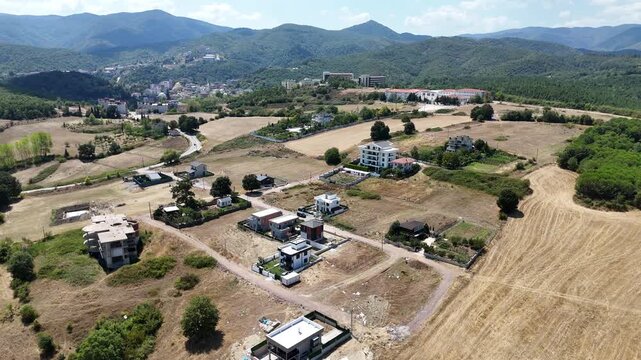 Rural houses built in an informal and unplanned layout, reflecting traditional countryside living, simple architecture, and authentic rural lifestyle.