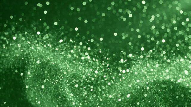 Abstract Green Glitter Background - This video features an abstract background filled with out-of-focus, shimmering green glitter.