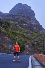 Photographer on Masca mountain road