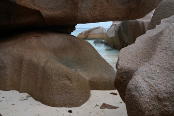 Day view of the Anse Source d Argent beach with its granite boulders on La Digue island in the Seychelles, one of the most beautiful beaches in the world
