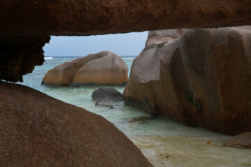 Day view of the Anse Source d Argent beach with its granite boulders on La Digue island in the Seychelles, one of the most beautiful beaches in the world
