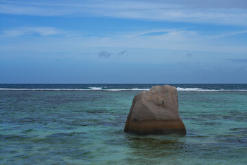 Day view of the Anse Source d Argent beach with its granite boulders on La Digue island in the Seychelles, one of the most beautiful beaches in the world