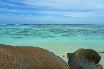 Day view of the Anse Source d Argent beach with its granite boulders on La Digue island in the Seychelles, one of the most beautiful beaches in the world