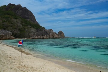 Day view of the Anse Source d Argent beach with its granite boulders on La Digue island in the Seychelles, one of the most beautiful beaches in the world