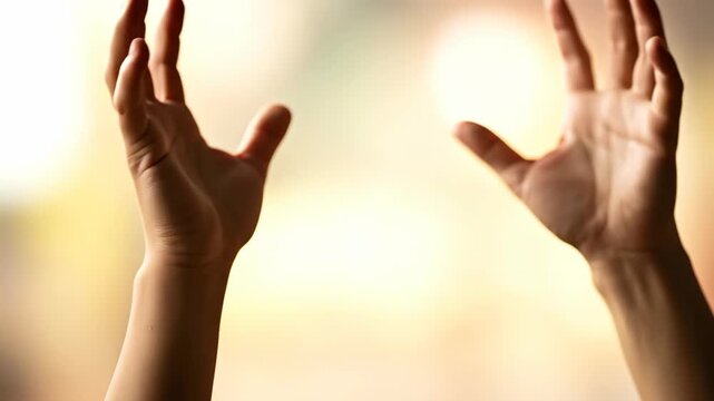 Two hands are clasped together in a moment of contemplation, symbolizing connection and tranquility in personal space.