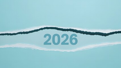 Abstract blue wave trace of a jet plane's flight path high in the sky over white clouds and ocean water