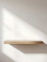 Minimalist wooden shelf against white wall