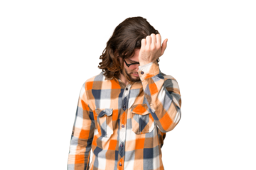 Young handsome man over isolated chroma key background with headache