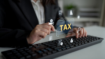 Concept of tax preparation and financial compliance. Filing official tax documents and forms for...