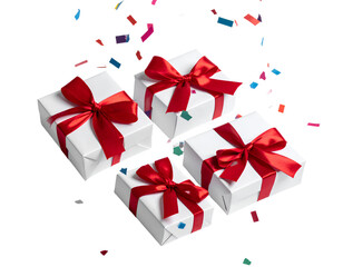 Several Christmas gift boxes wrapped in white paper with bold red ribbons positioned