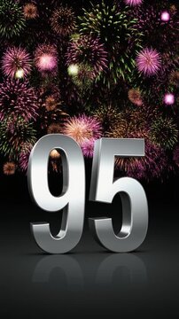 Silver number 95 with fireworks in the background. Festive scene for birthday or anniversary party
