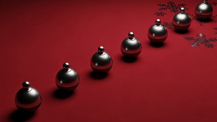 Minimalist holiday composition showcasing silver ornaments and snowflakes on a red surface