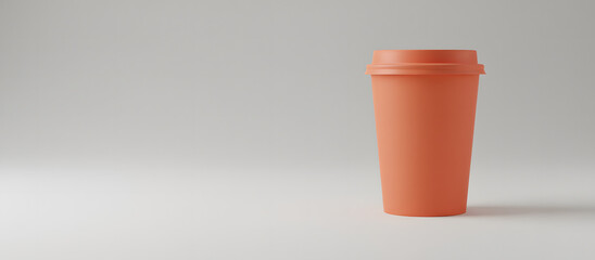 Orange takeaway coffee cup on minimalist gray background  