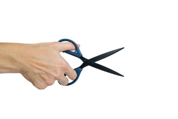 Close up of a right hand holding open blue scissors, isolated on a white background.