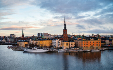 Panoramic view of Riddarholmen island and Riddarholmen Church in central Stockholm at sunset