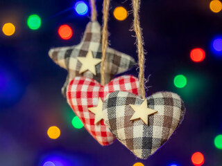 Hanging Plaid Hearts with Stars Decor Under Colorful Christmas Lights