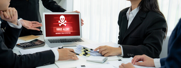 Virus warning alert on computer screen detected brisk cyber threat , hacker, computer virus and malware