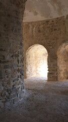 Fototapeta premium An ancient stone arch on the seashore. High quality photo