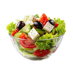 Greek salad in glass bowl with feta, tomatoes, cucumbers, olives, lettuce