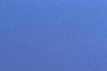 blue paper background texture light rough textured spotted blank copy space background in blue