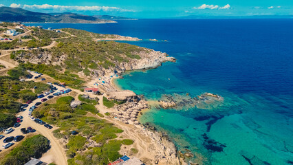 Family summer vacation on Tigania Beach situated in Greece. Sithonia Coastline with tranquil turquoise water.