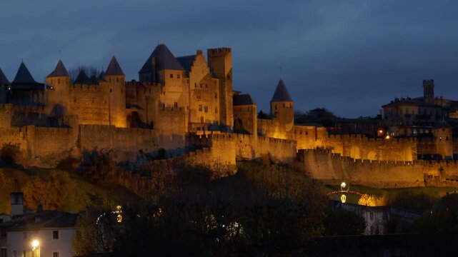 Illuminated Medieval Walls of Carcassonne at Night, France