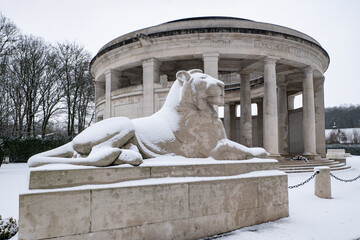 Ploegsteert (Plugstreet) Memorial to the Missing in Berks cemetery extension Belgium during winter. WWI monument with stone lions and circular colonnade in the snow.