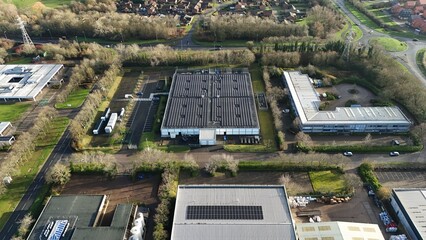 Aerial drone view of large scale cutting-edge technology and futuristic infrastructure of a large-scale data center in Milton Keynes, UK. AI cloud quantum computing. 