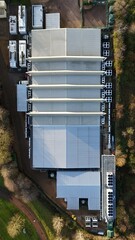 Aerial drone view of large scale cutting-edge technology and futuristic infrastructure of a large-scale data center in Milton Keynes, UK. AI cloud quantum computing. 